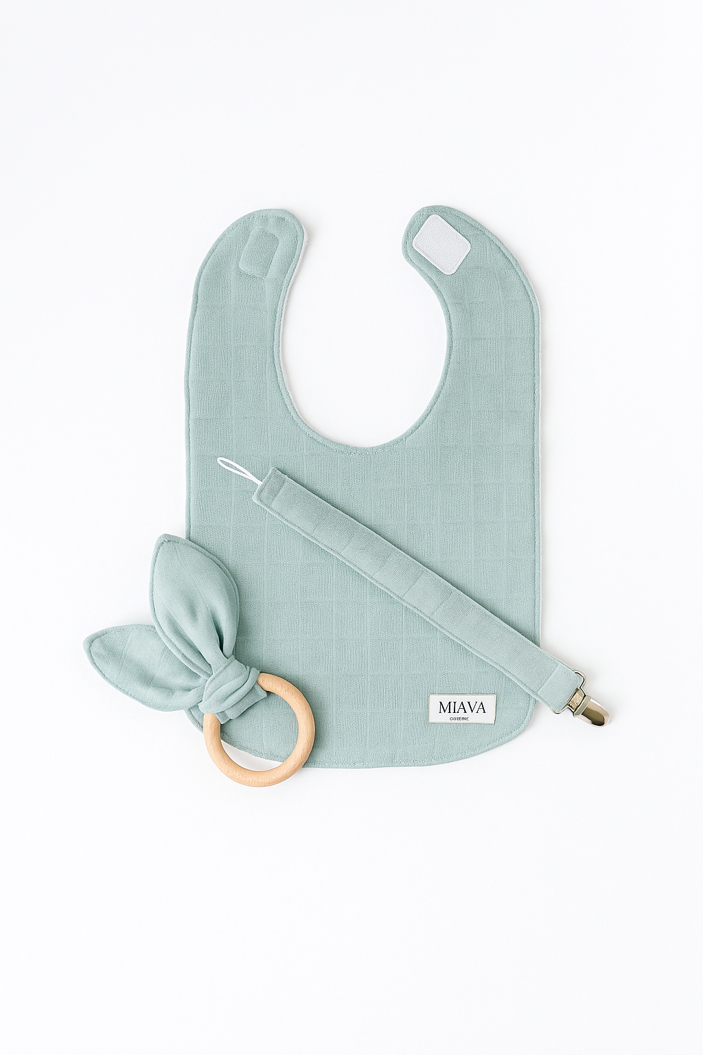 Bib, dummy clip and toy set